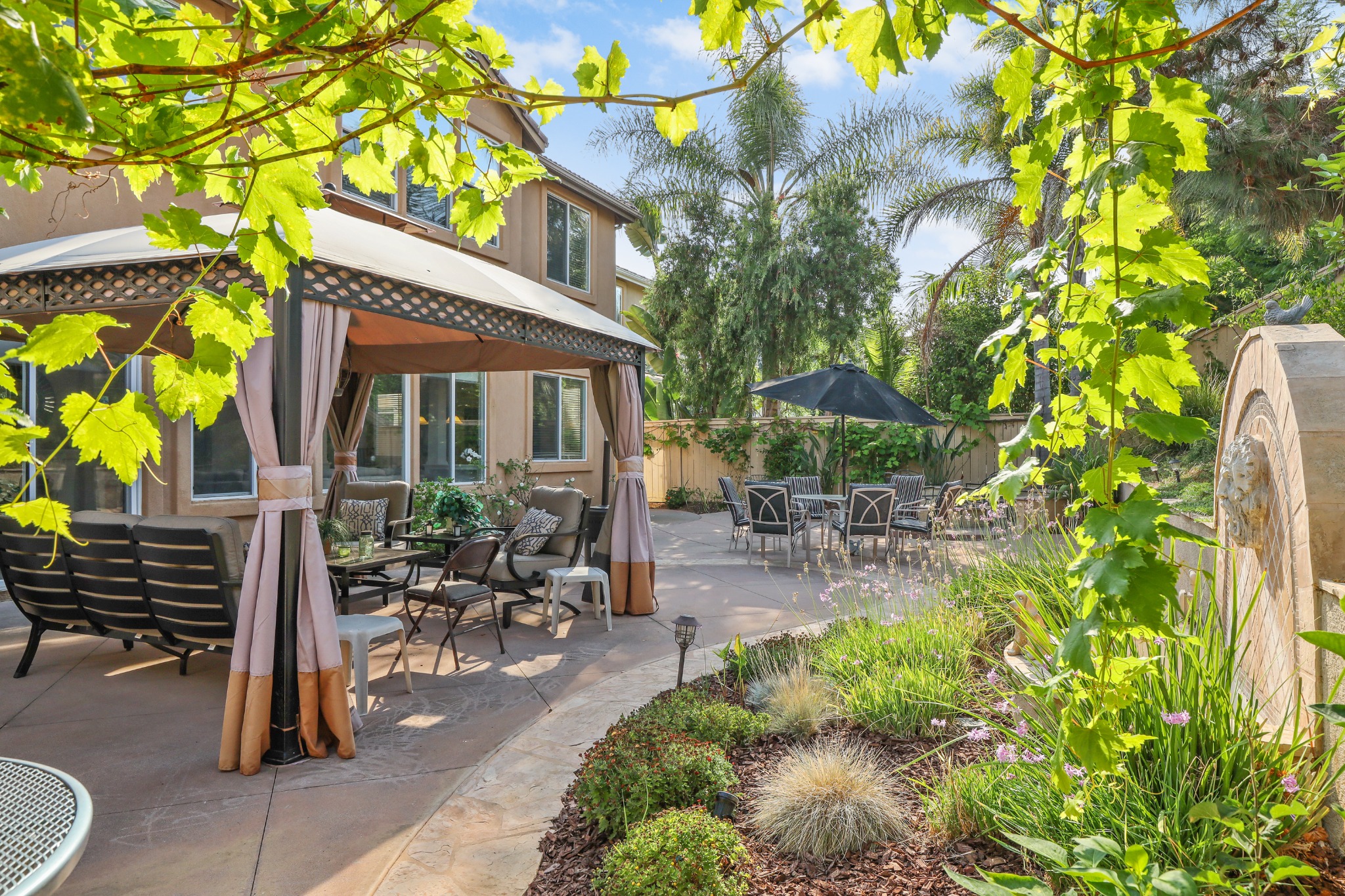 Lush backyard patio and gazebo